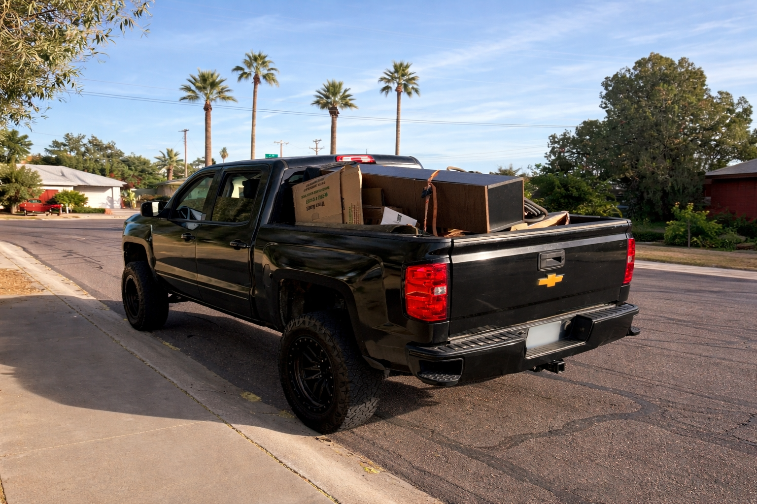 T&B Junk Removal loaded truck with boxes